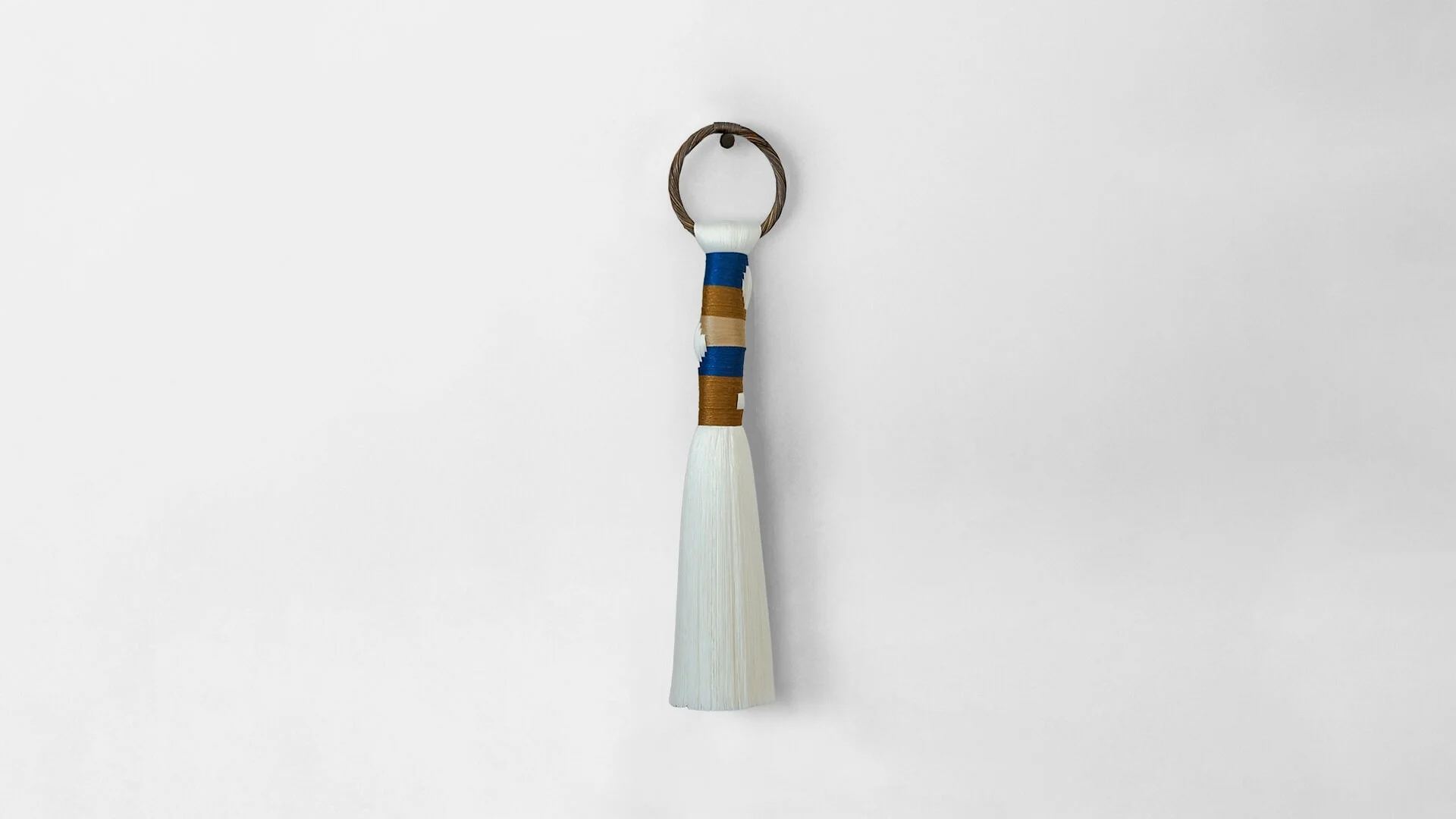 Pompon Eramar. Ornement textile en bambou et osier