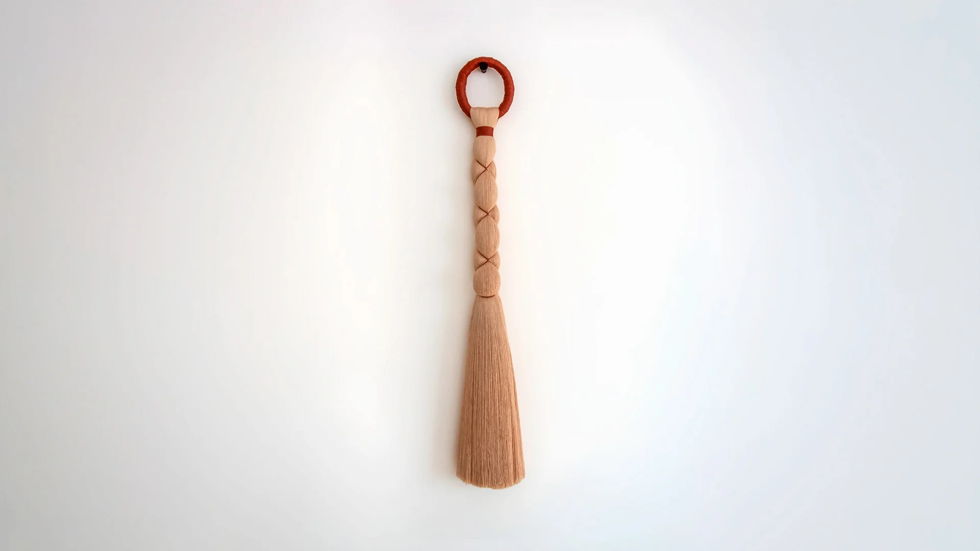 Senda Hoop. Handcrafted textile wall sculpture in natural fibers