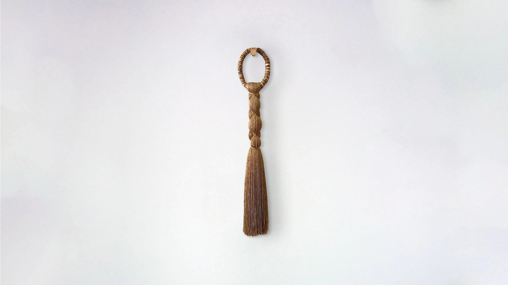 Senda tassel Handcrafted textile ornament in natural fibers