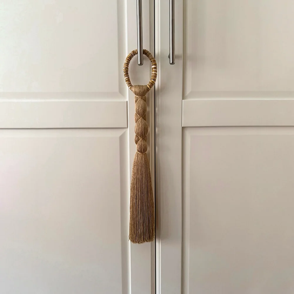 Senda tassel. Handcrafted textile ornament in natural fibers