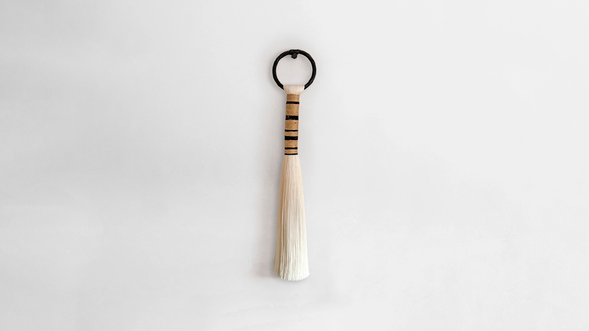 Sonata tassel Textile ornament in bamboo and jute Sonata tassel Textile ornament in bamboo and jute